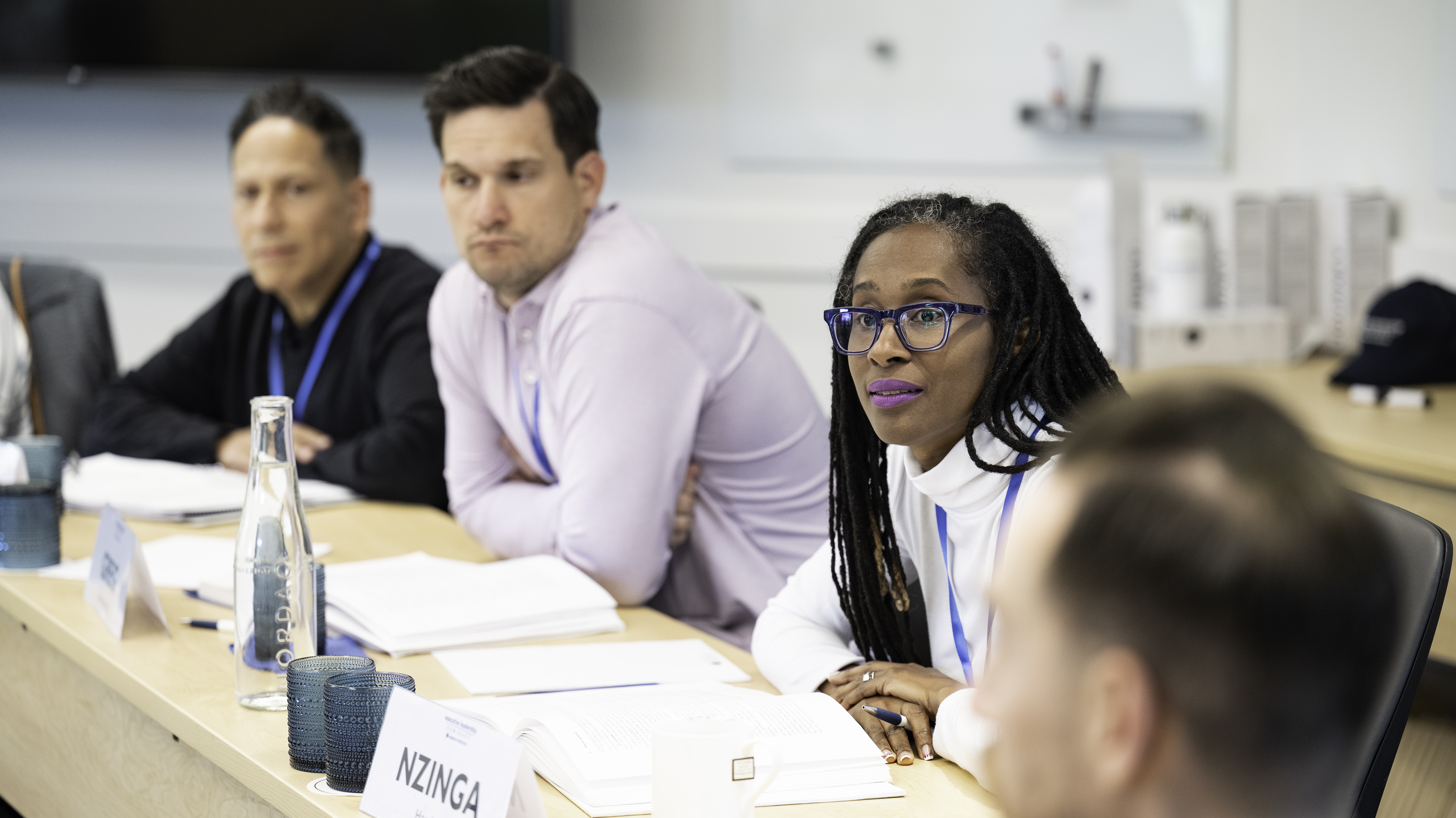 Group of participants around the seminar table